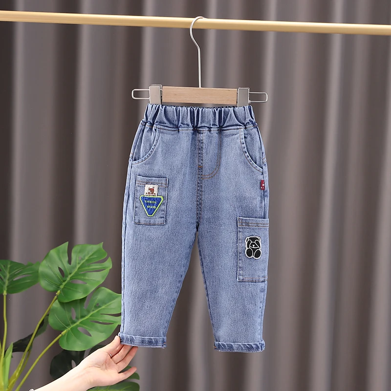 kf-S50cc63ee3ea7444794b92673780775716-New-Hot-Baby-Boys-Girls-Jeans-Pants-Children-Trousers-Boys-Girls-Jeans-Boys-Casual-Pants-Cartoon