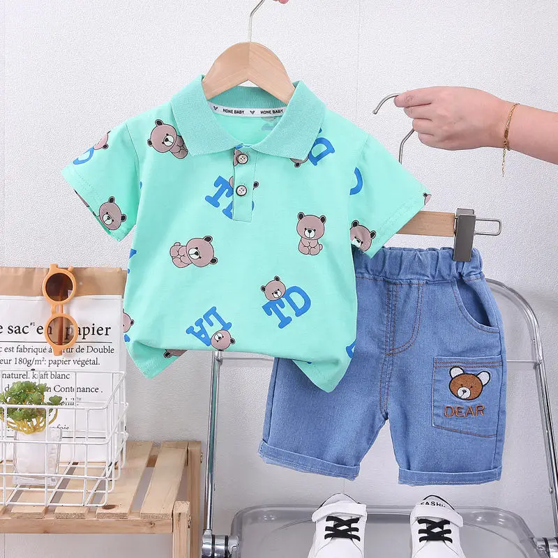 kf-S8f2a15e5275746cc996a8b1663012cb8f-Baby-New-Summer-Cartoon-Clothing-Children-Boy-Girls-cartoon-Printe-Bear-T-Shirt-Shorts-2Pcs-sets