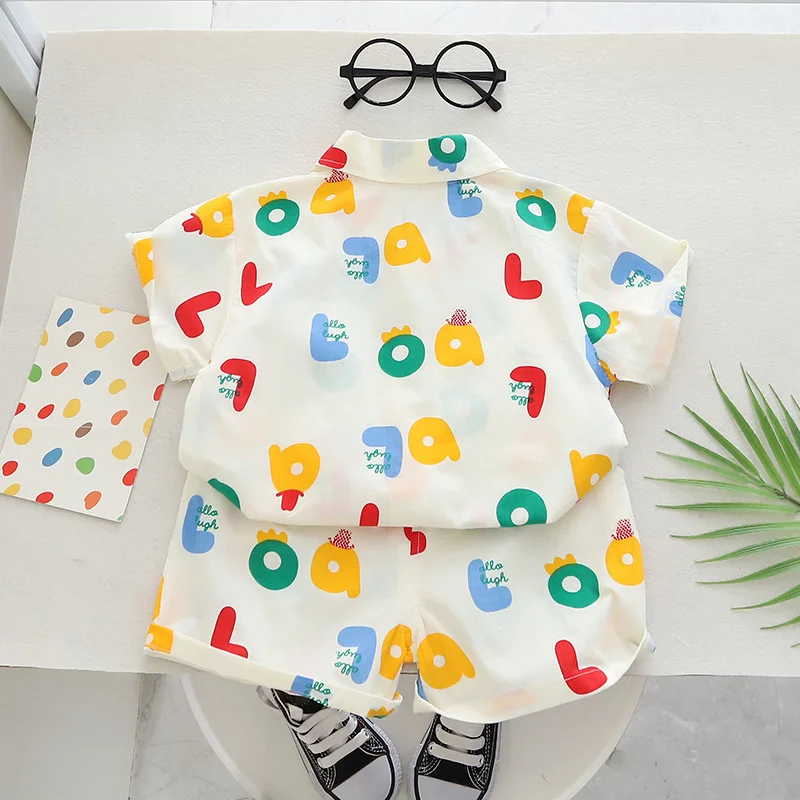 kf-Sb1157c1981574274b59fd2bb21fd5b6cn-New-Summer-Baby-Clothes-Suit-Children-Boys-Casual-Letter-Shirt-Shorts-2Pcs-Sets-Toddler-Costume-Infant